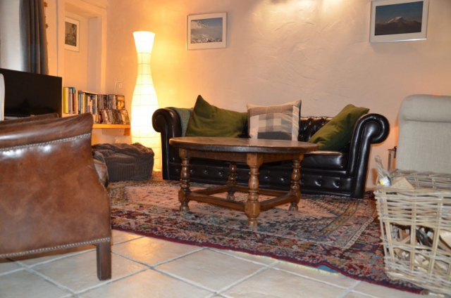 comfortable chalet alps sofas fireplace